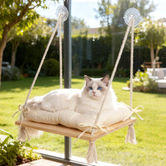 AeedWisp Cat Window Perch shown from the front with its hammock seat and cushion.