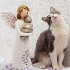 BORLESTA cat memorial figurine close-up highlighting its white angel wings.