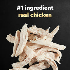 Cesar chicken wet dog food topper shown in a close-up of its chicken recipe.