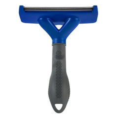 FURminator large dog undercoat deShedding tool with its curved edge in focus.