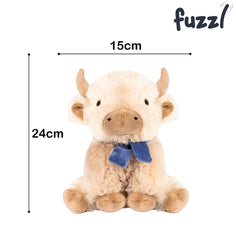 Fuzzl Highland Cow plush dog toy shown during a game of fetch.