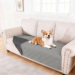 The hyha dog blanket shown from the front as a reversible furniture cover.