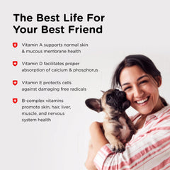 A puppy taking a Nutri-Vet Puppy multivitamin chewable.