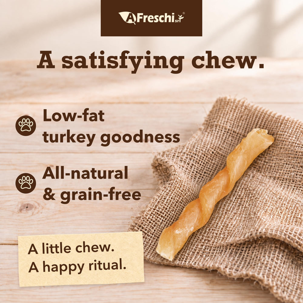 A Freschi srl turkey tendon dog treat displayed in its coil shape.