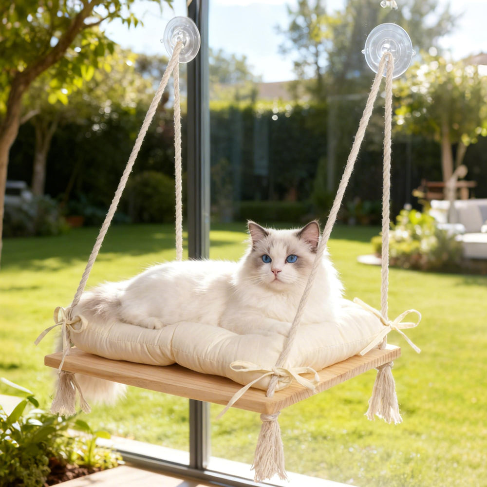 AeedWisp Cat Window Perch shown from the front with its hammock seat and cushion.