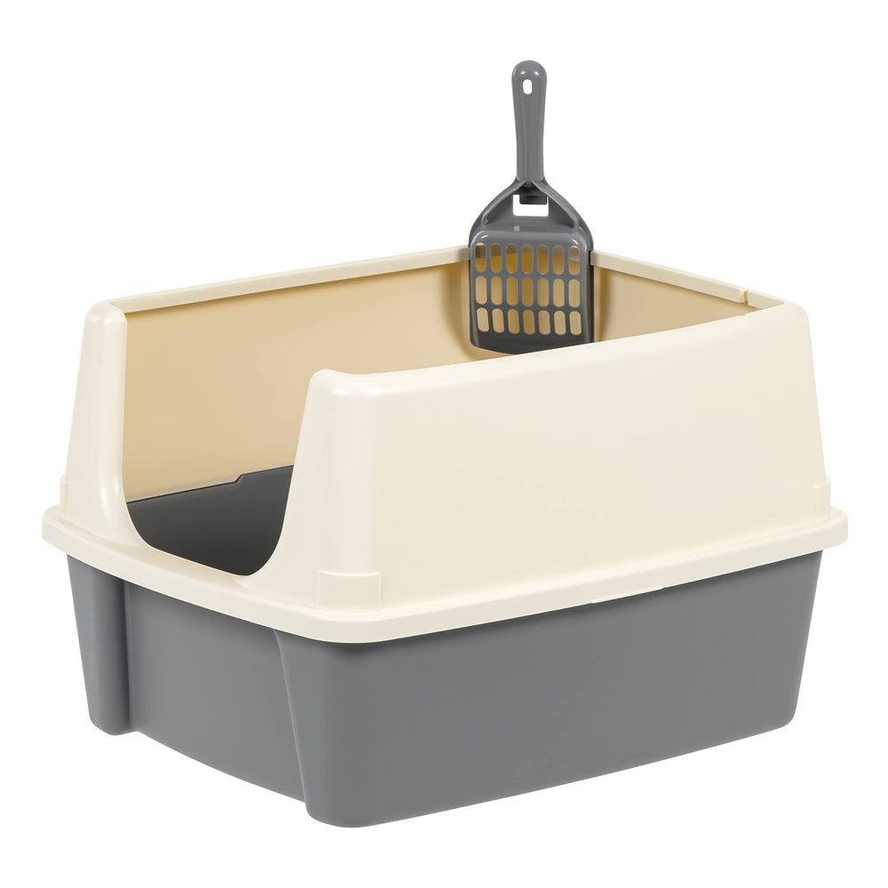 Amazon Basics cat litter box with the scoop stored on the box.
