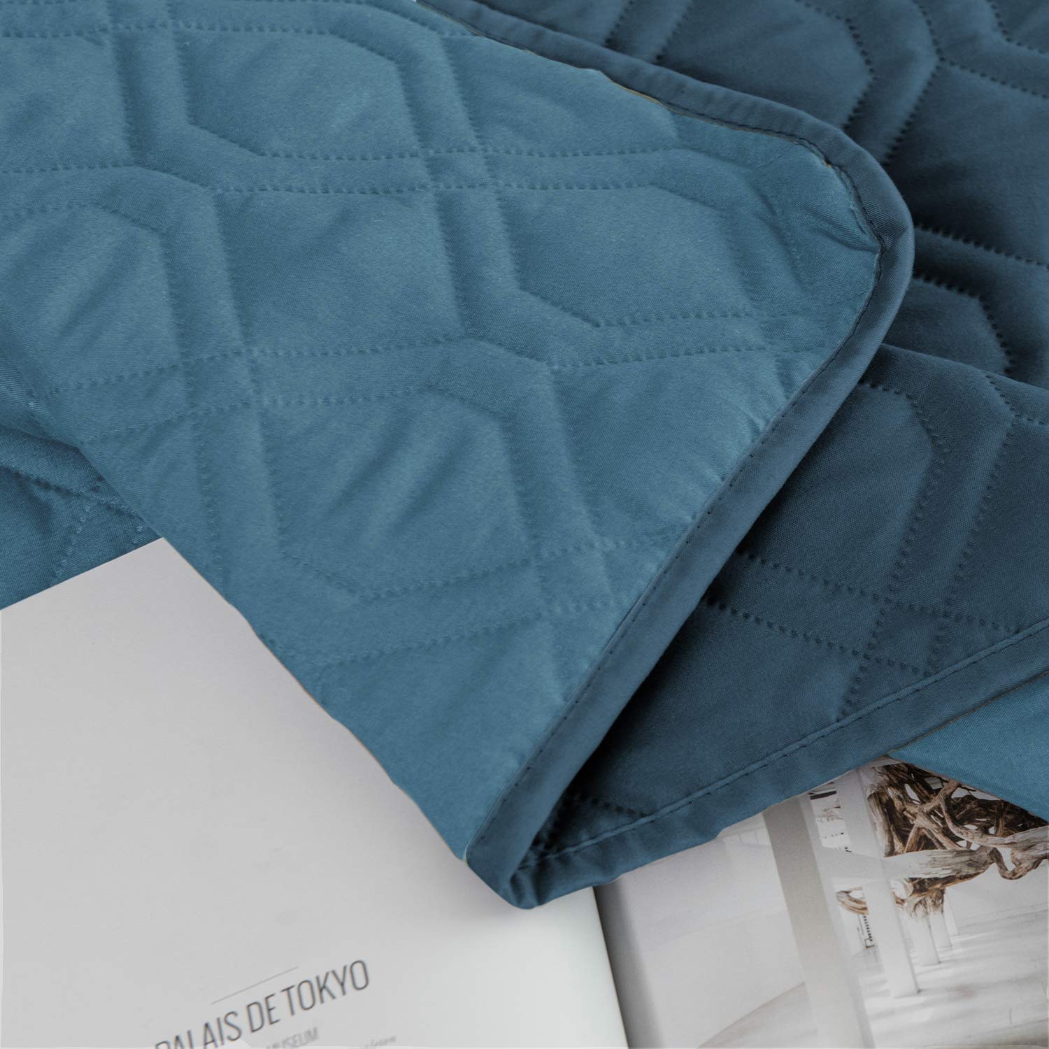 Ameritex dog blanket shown in a close-up view of its soft fabric.