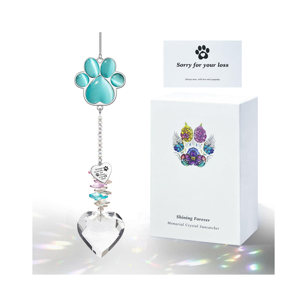 AMETHUARTZ pet memorial suncatcher shown from the front with its paw charm and crystal pendant.