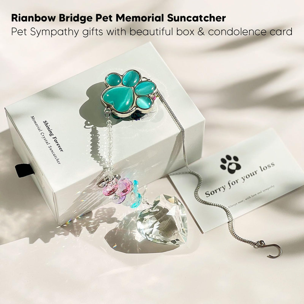 AMETHUARTZ pet memorial suncatcher close-up showing the cat’s-eye stone paw charm.