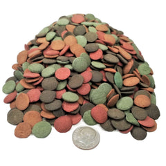 Aquatic Foods Inc. sinking wafer mix shown being used for aquarium feeding.