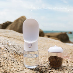 AVELORA dog water bottle with its dry-food storage compartment.