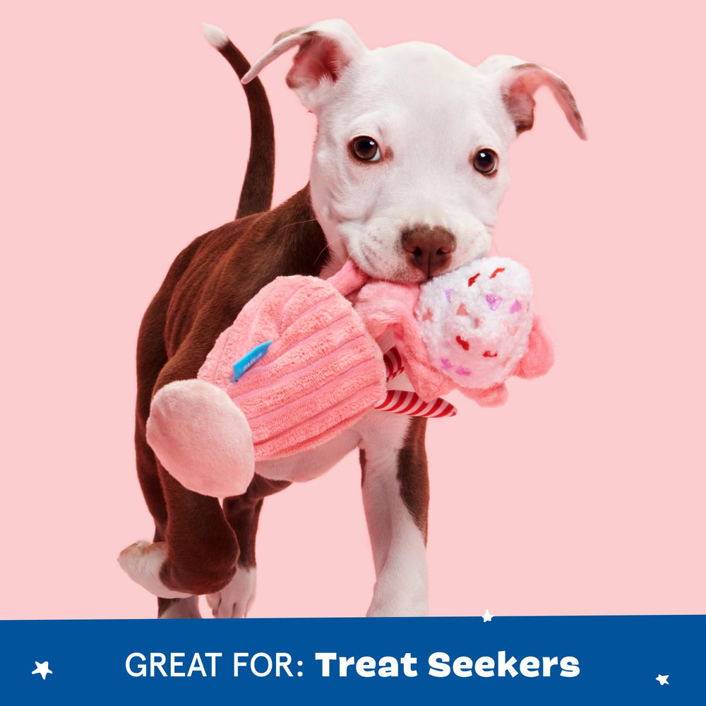 BarkBox Red Whine Milkshake plush dog toy highlighting the internal disc squeaker.