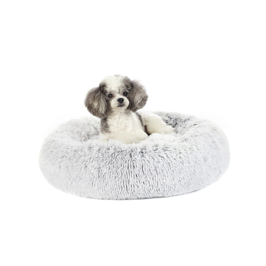 Bedfolks donut dog bed shown from the front in light grey.