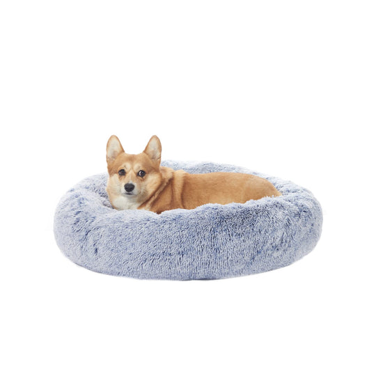 Bedfolks donut dog bed shown from the front in navy blue.