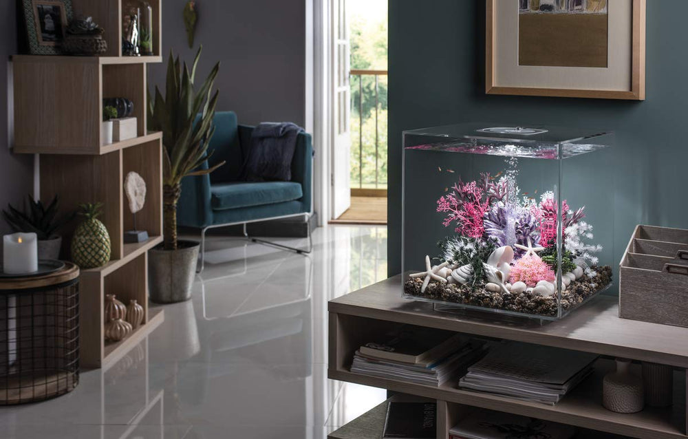 biOrb Marble Pebble Set arranged as textured décor across an aquarium foreground.
