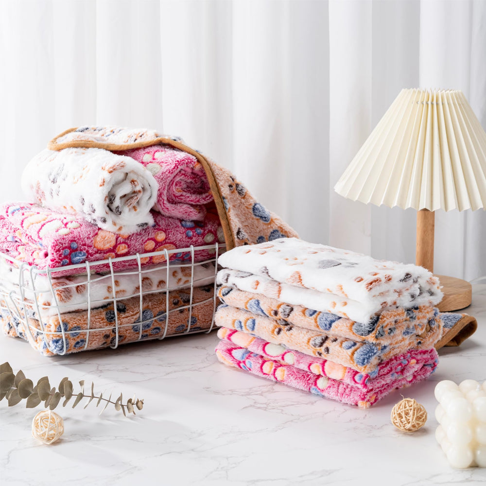 CADONO pet blankets shown in the small, medium, and large size options.