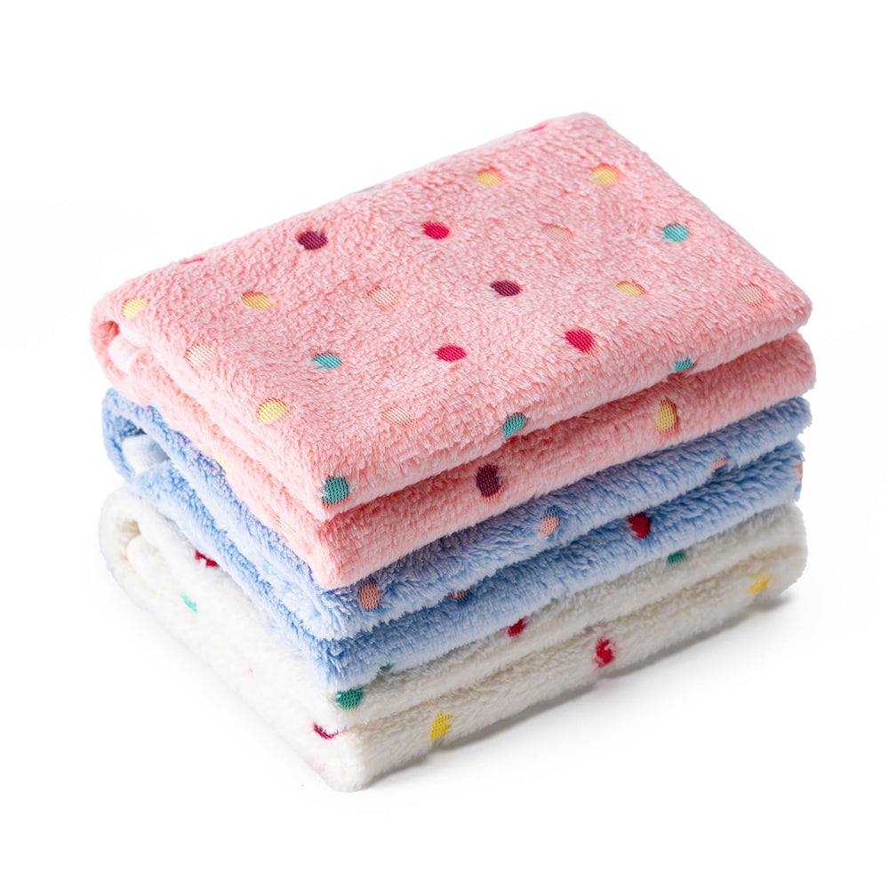 CADONO pet blankets shown as a three-piece set in white, pink, and blue.