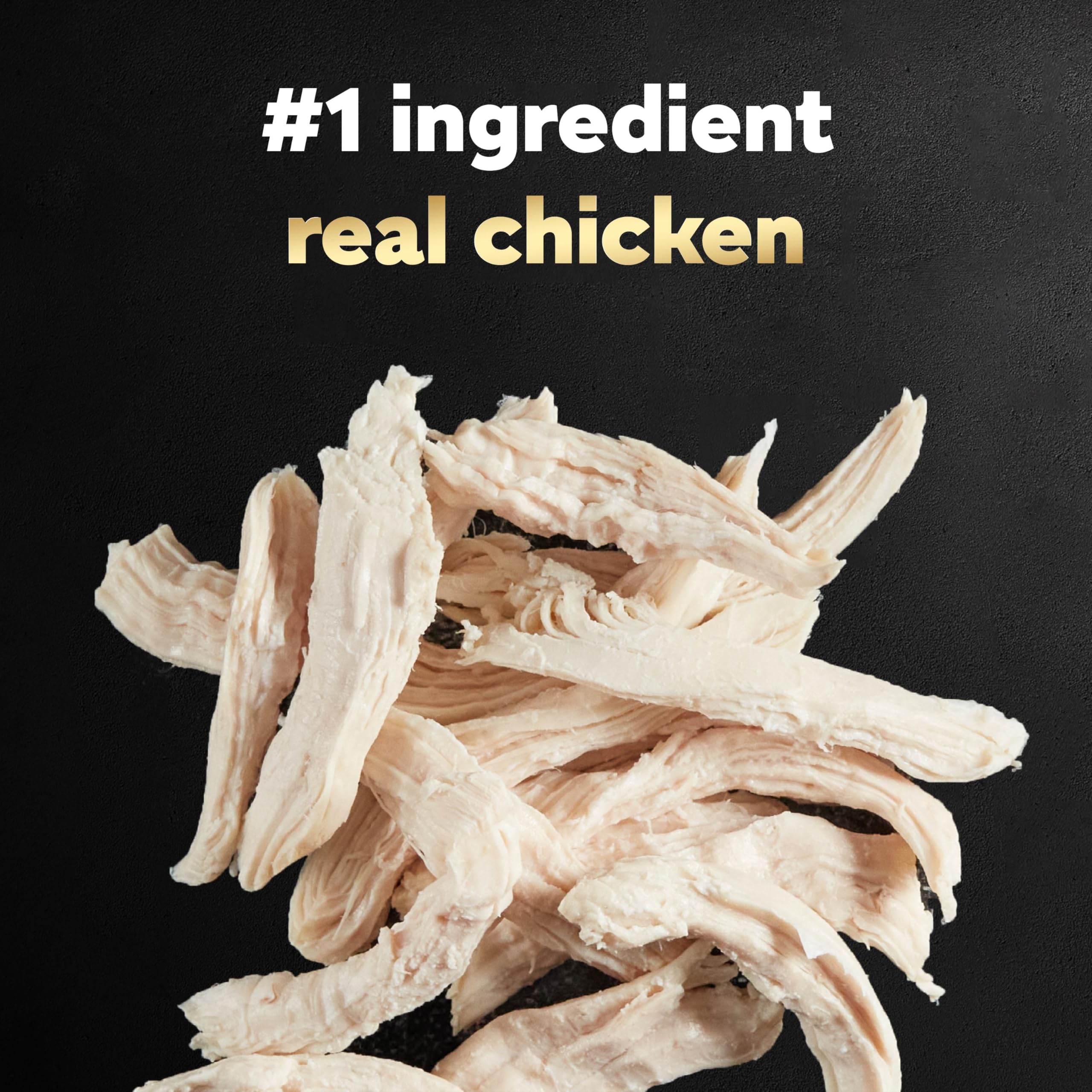 Cesar chicken wet dog food topper shown in a close-up of its chicken recipe.