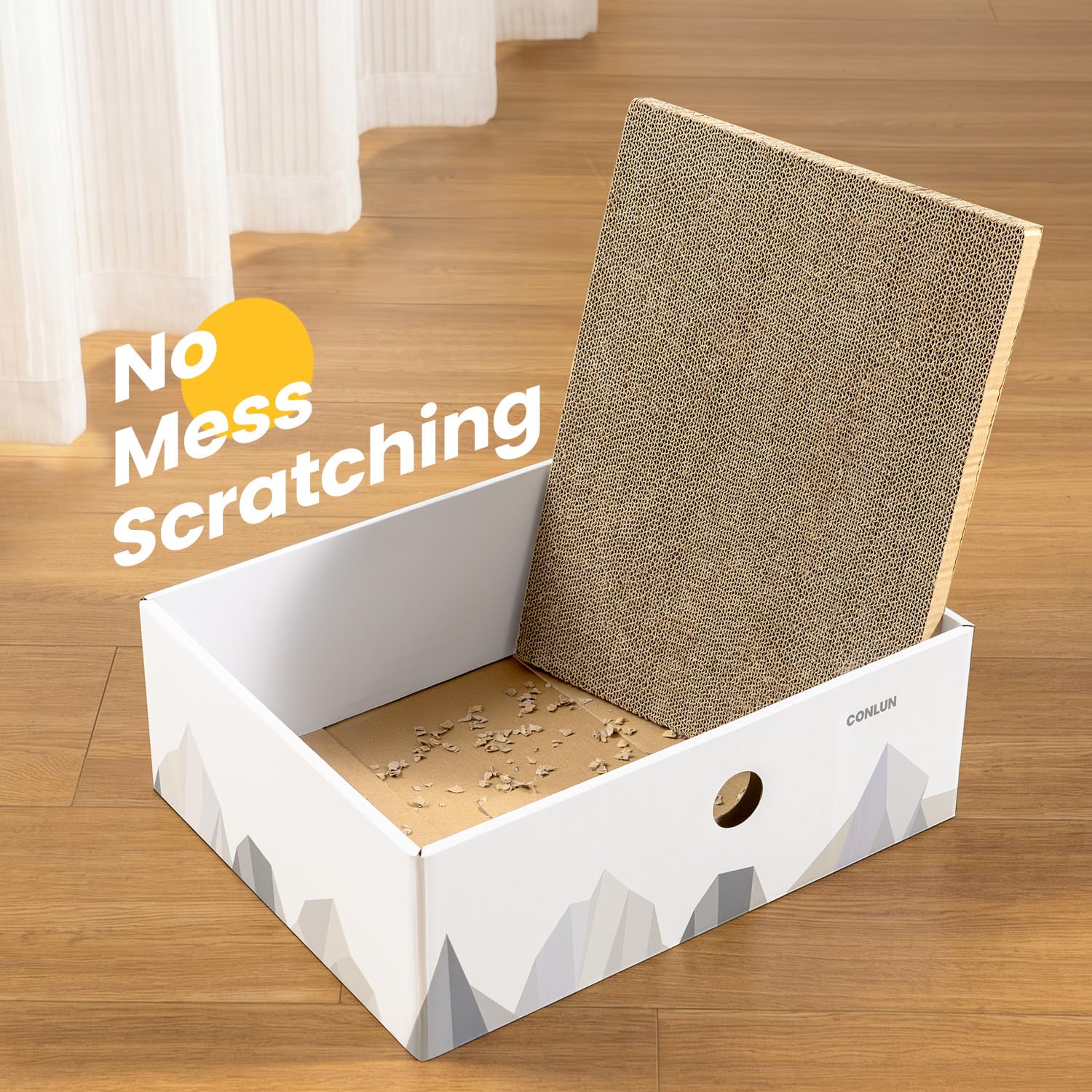The paw hole in the Conlun Cat Scratcher Box invites cats to reach and explore.