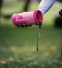 Dexas MudBuster dog paw cleaner shown from an alternate angle in pink.