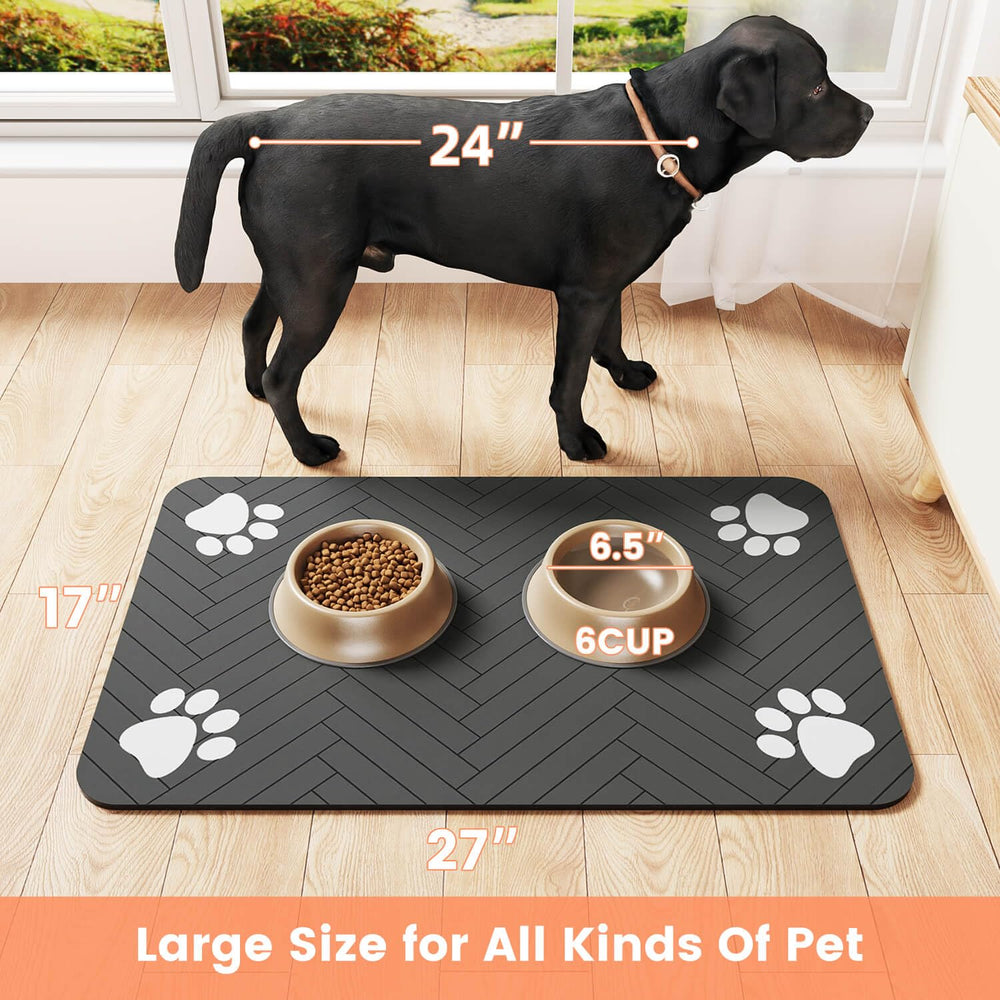 DK177 pet feeding mat being wiped clean with a damp cloth.