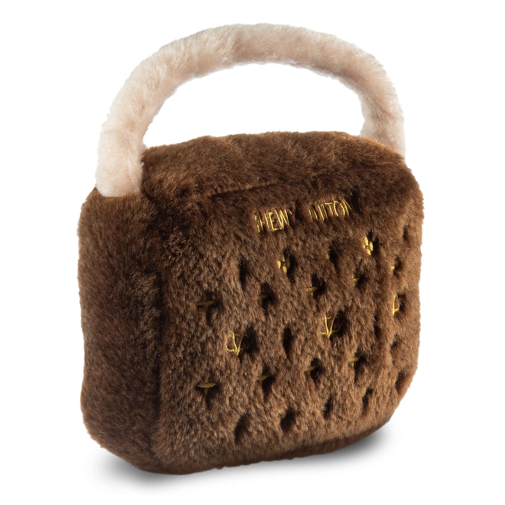 Dog Diggin Designs Chewy Vuiton plush dog toy showing its soft plush exterior.