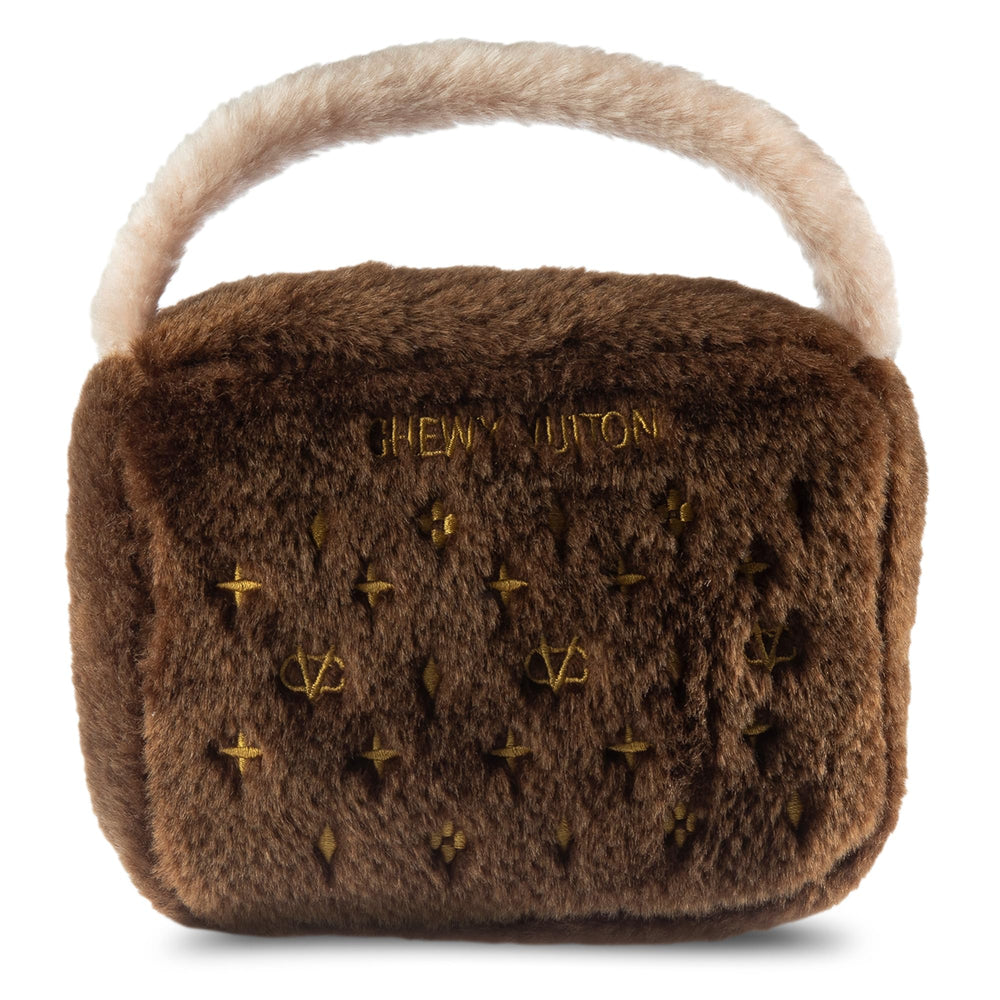 Dog Diggin Designs Chewy Vuiton plush dog toy shown from the front in its purse shape.