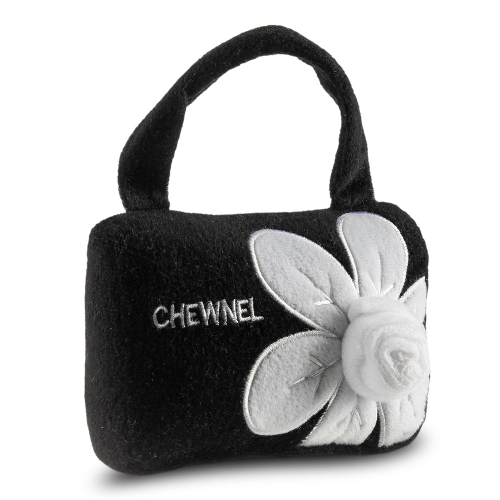 Dog Diggin Designs Chewnel Fleur Blanche plush dog toy shown close up to highlight its floral pattern.
