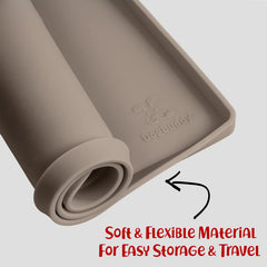 DogBuddy Dog Food Mat rolled up for compact storage.