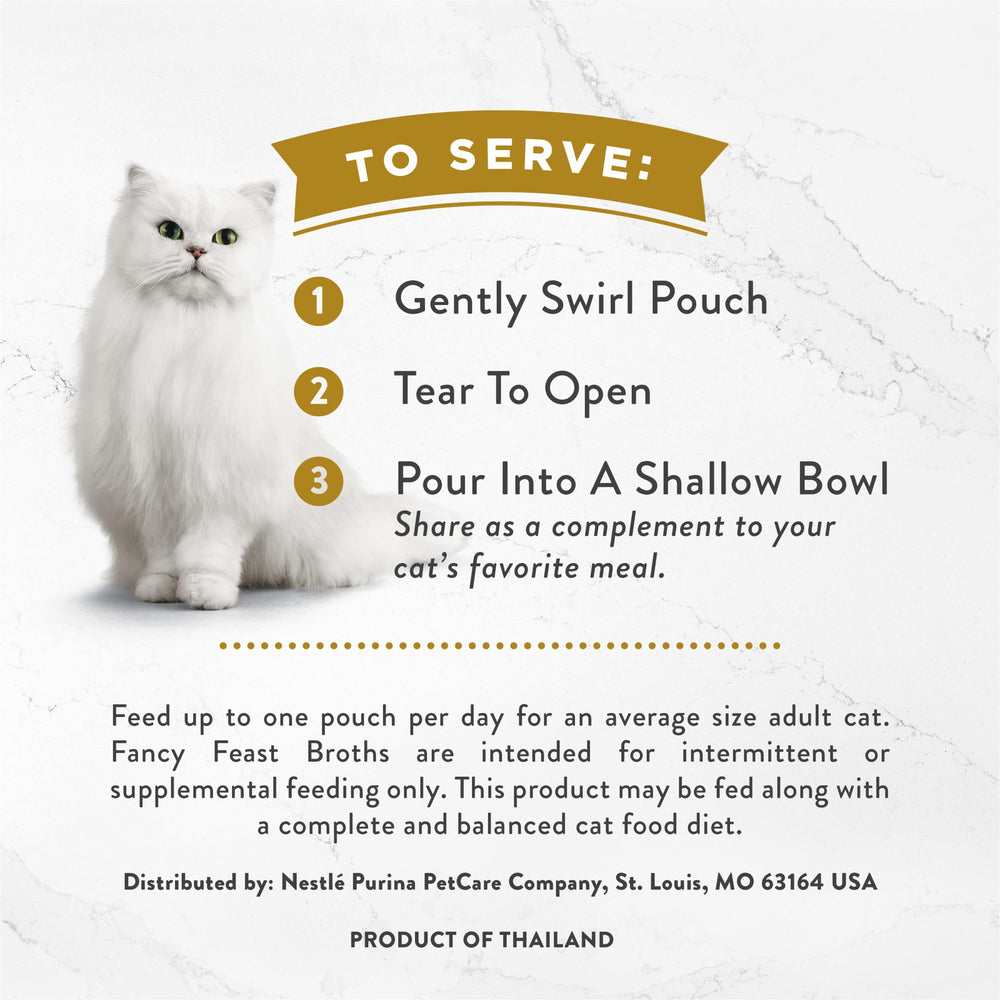 Fancy Feast creamy broth cat food topper featuring wild salmon and whitefish.