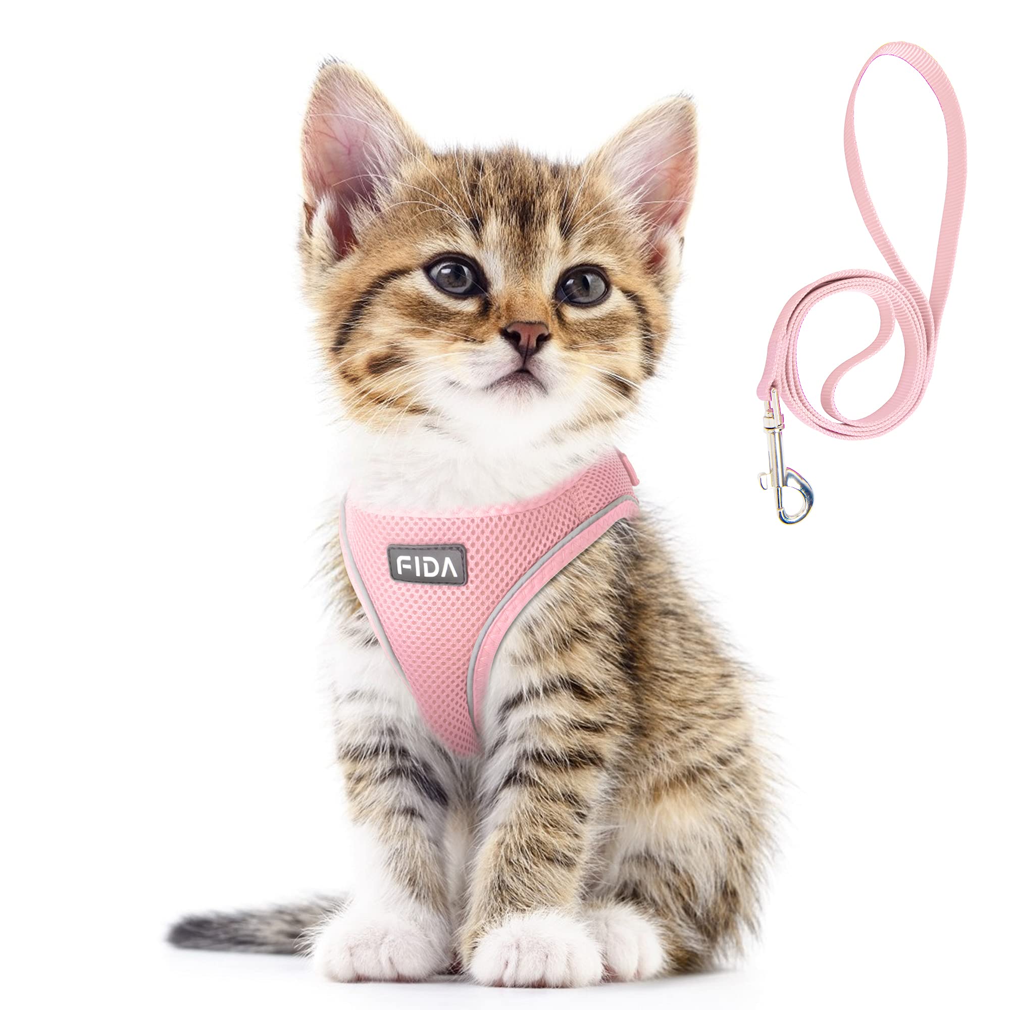 Fida dog harness shown from the front in pink.