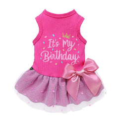 Fitwarm birthday dog dress shown from the front in pink with its party design.