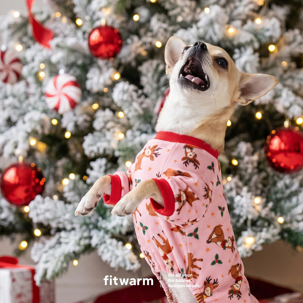 Fitwarm Christmas reindeer dog pajamas detail showing holly and star accents on pink fabric.