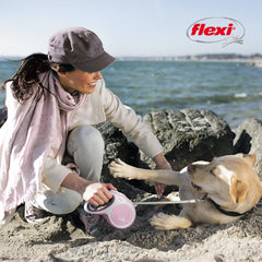 FLEXI Comfort Tape retractable dog leash shown with its tape extended.