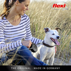 FLEXI Classic Double Cord retractable dog leash being used to walk two dogs.