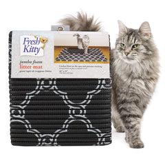 Fresh Kitty foam litter mat shown from the front in its black and white quatrefoil pattern.