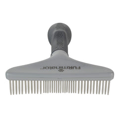 FURminator Grooming Rake close-up of its rotating metal teeth.