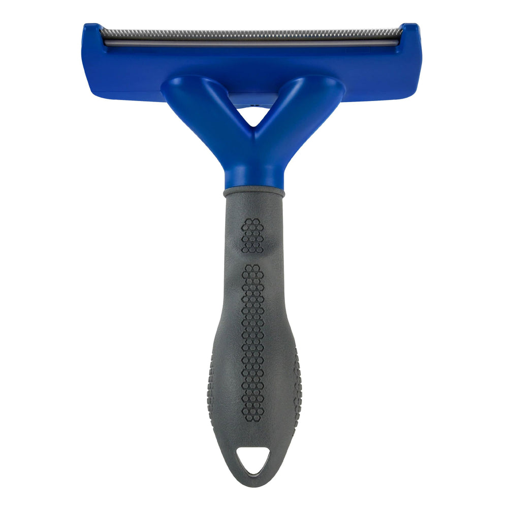 FURminator large dog undercoat deShedding tool with its curved edge in focus.