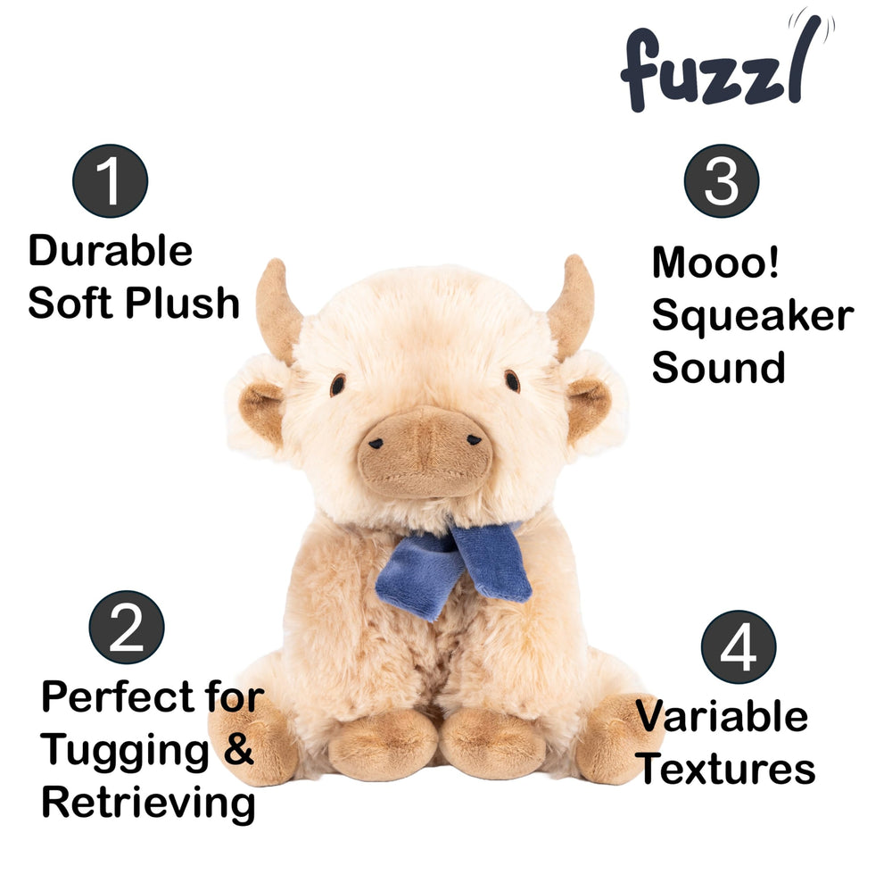 Fuzzl Highland Cow plush dog toy with its soft plush texture in focus.