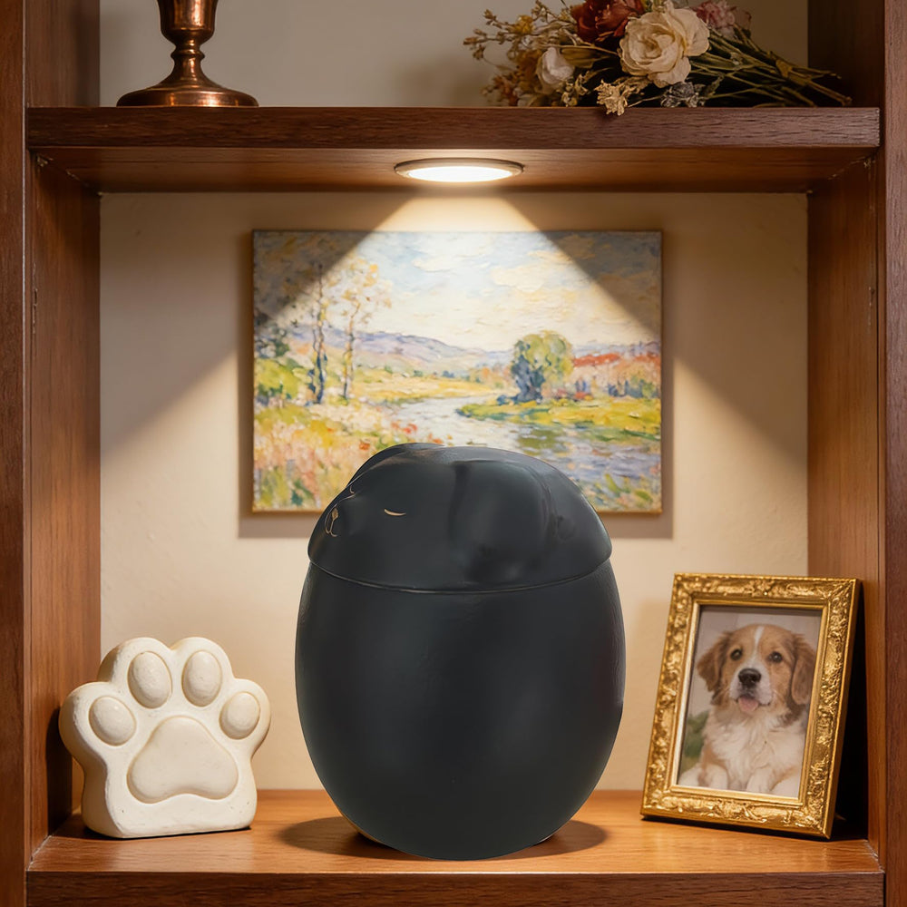 Generic small dog urn pictured with the included urn bag.