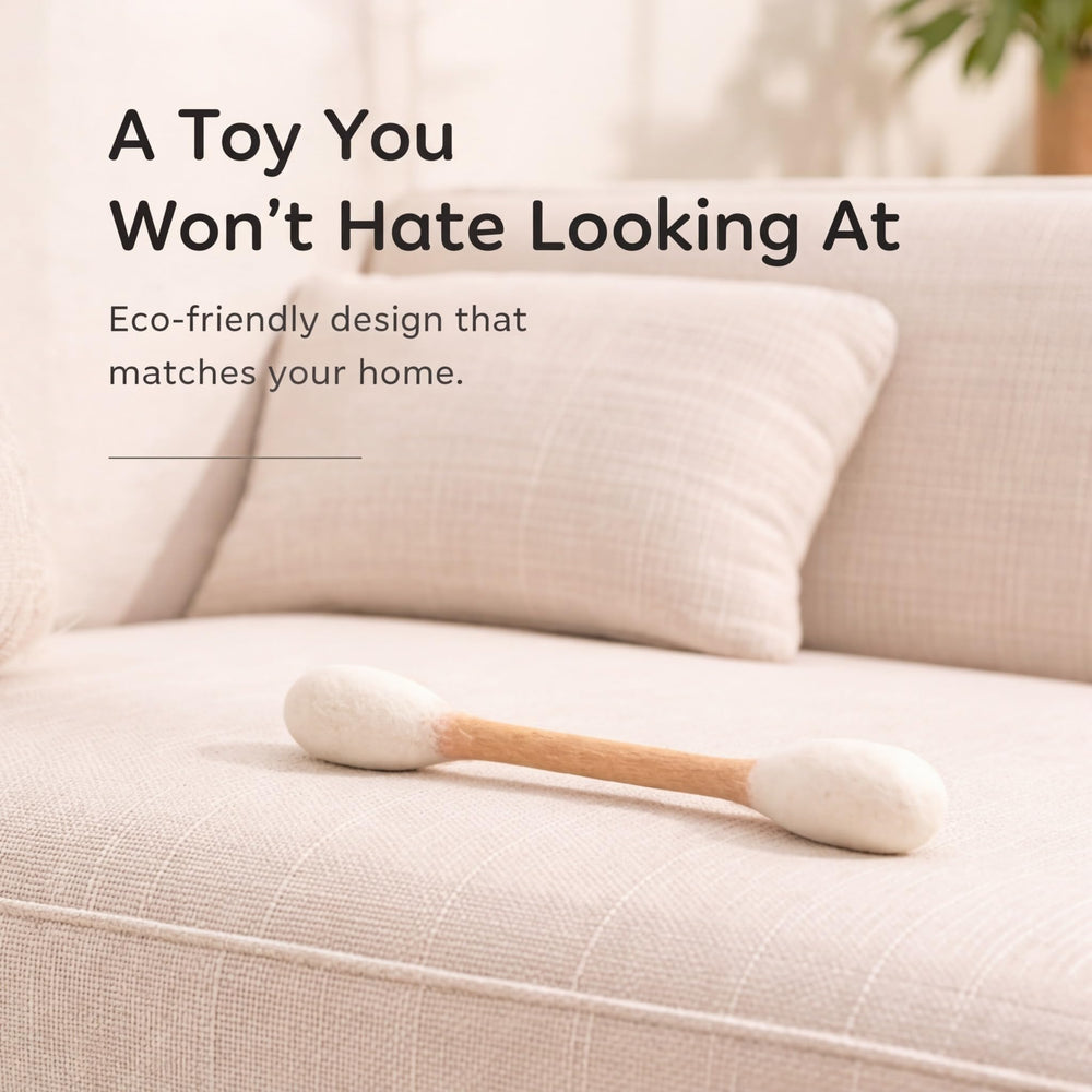 Glaciart One Giant Swab cat toy shown as a cat grabs and kicks it.