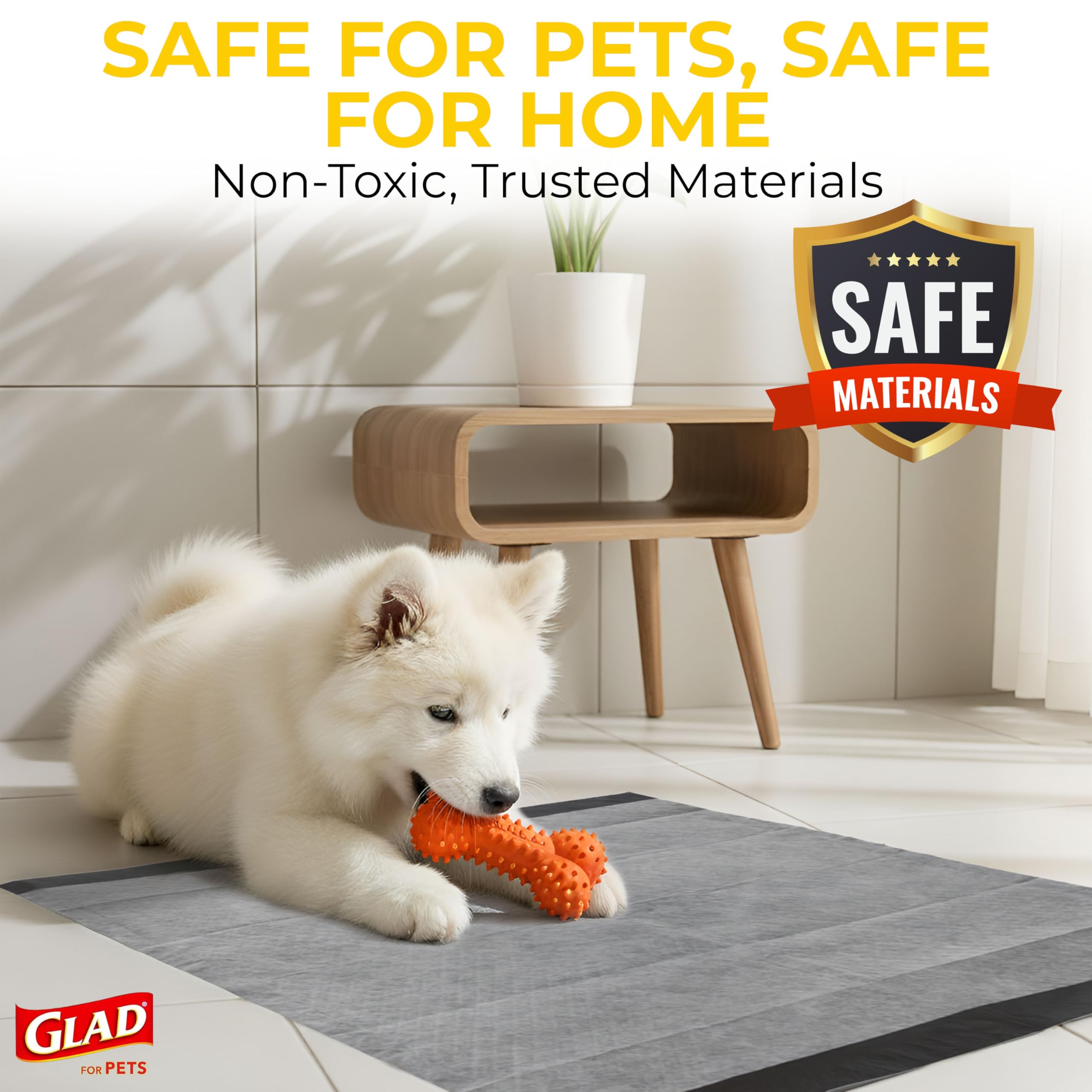 Glad for Pets puppy pad placed flat inside a crate.