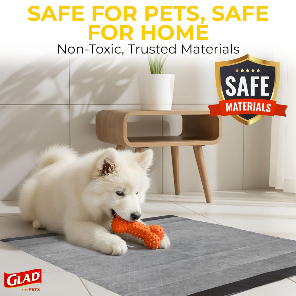 Glad for Pets puppy pad placed flat inside a crate.