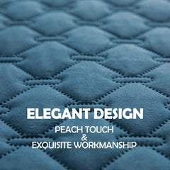 gogobunny loveseat cover shown on a bed.