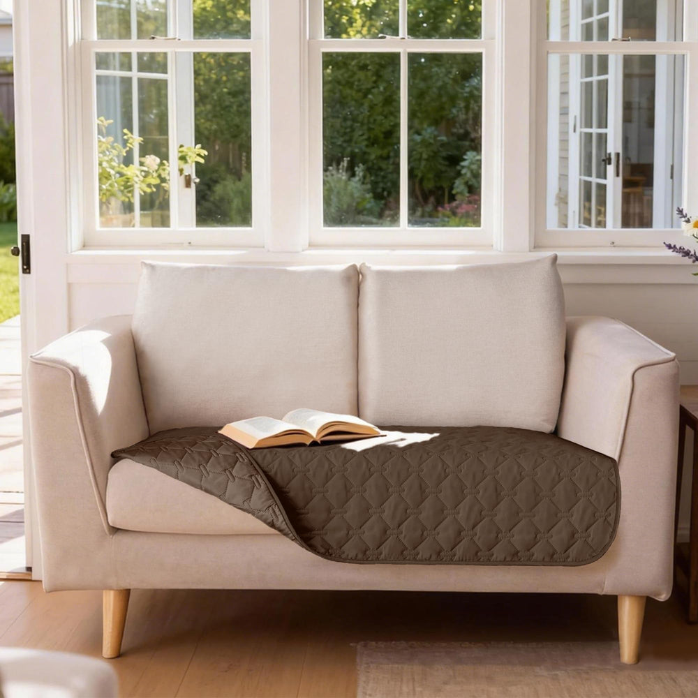 gogobunny loveseat cover shown on a couch shared with a dog.