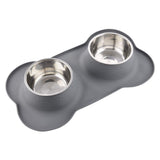 Guardians dog and cat bowl set with two stainless-steel bowls on its grey silicone mat.