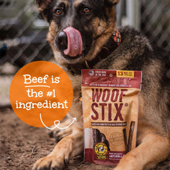 Happy Howie's Woof Stix offered to a dog as a treat reward.