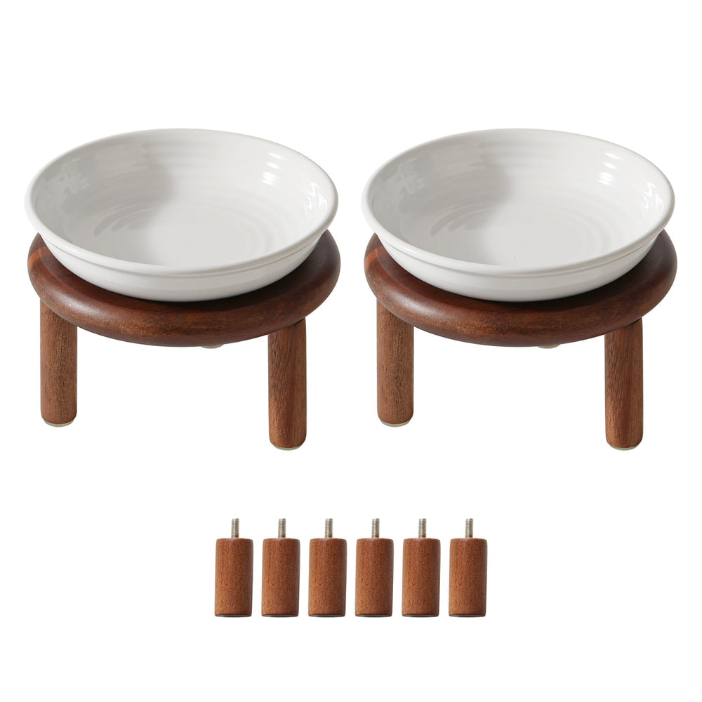 Havniva ceramic cat bowl with its acacia wood stand shown from the front.