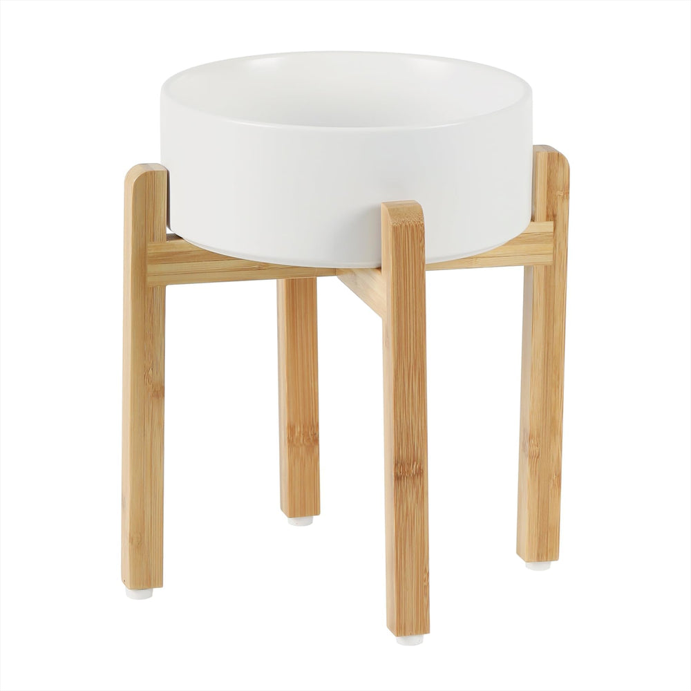 Havniva elevated ceramic dog bowl shown with its bamboo stand.