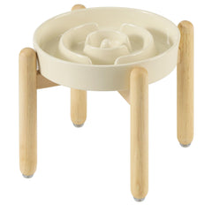 Havniva slow feeder dog bowl shown from the front with its ceramic dish and wooden stand.